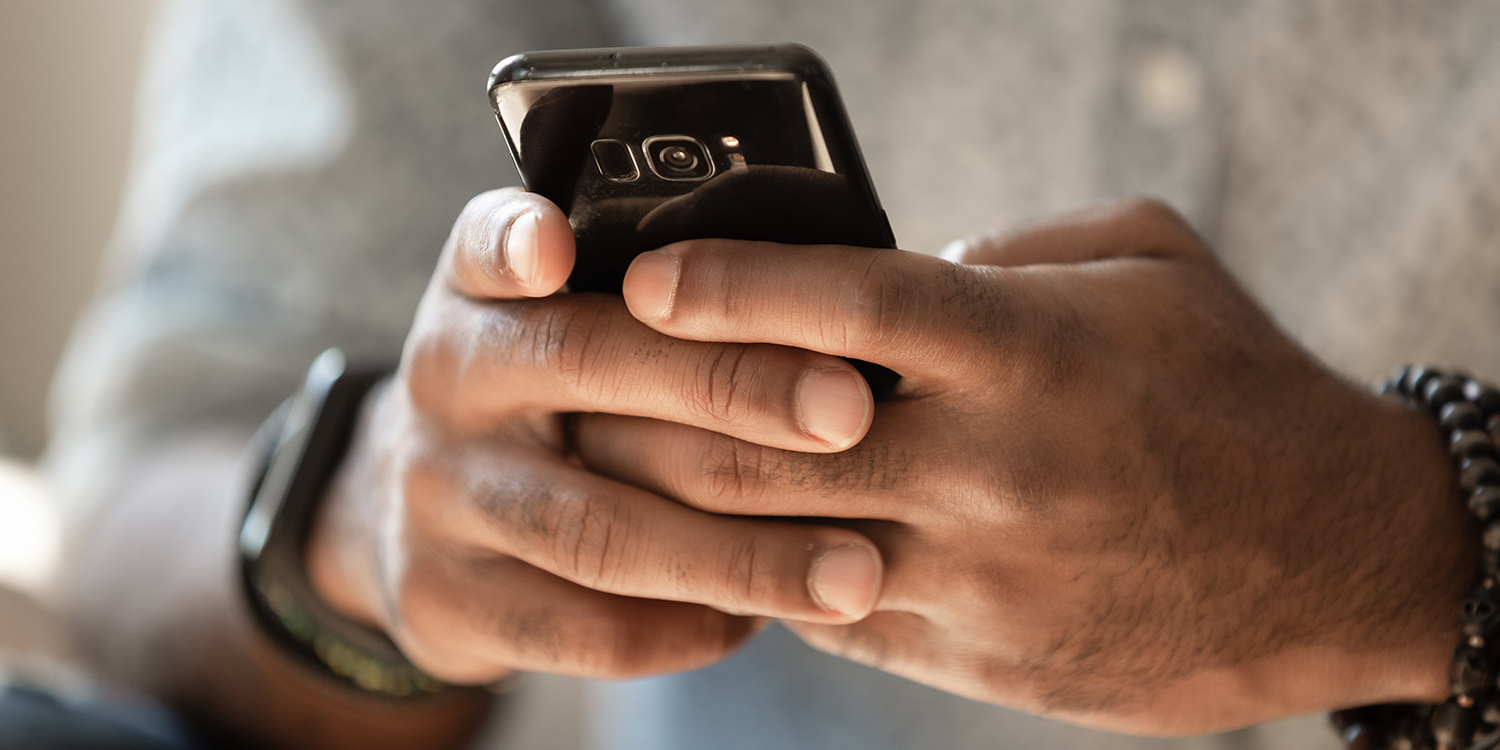 Man holding cell phone